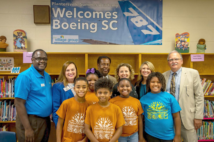 Boeing group with students