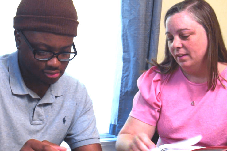 teacher tutoring student