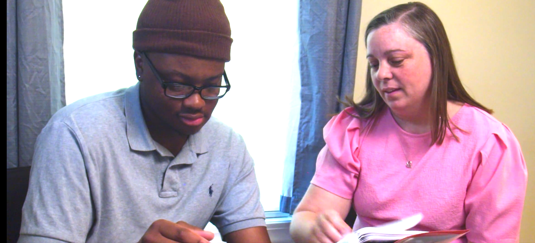 teacher tutoring student