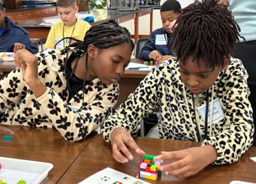 girls collaborating in STEM classes