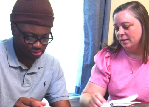 teacher tutoring student
